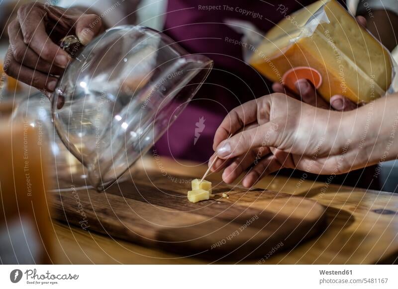 Tasting of cheese in farm shop, close-up Cheese tasting testing hand human hand hands human hands Food foods food and drink Nutrition Alimentation