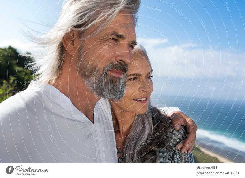 Portrait of a handsome senior couple at the sea romantic lyrical Romance twosomes partnership couples attractive beautiful pretty good-looking Attractiveness