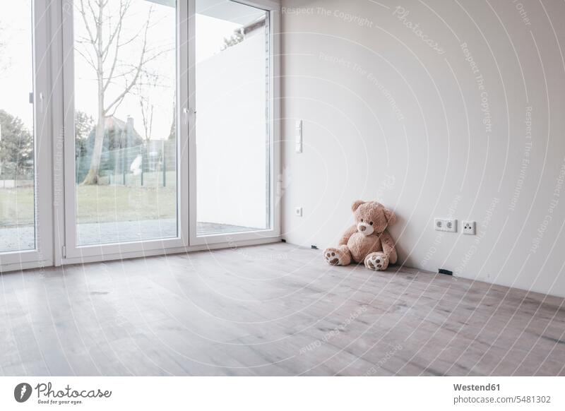 Teddy bear in empty room family planning flat flats apartment apartments property moving house move Moving Home starting a family desire to have children