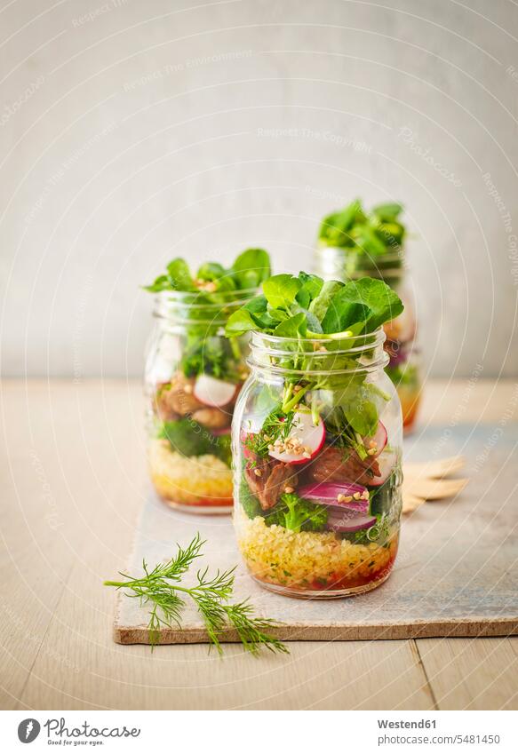 Preserving jar of buckwheat salad with vegetables and diced Striploin Steak takeaway food Take Away Food Raw Food preserving jar Mason Jars mason jar