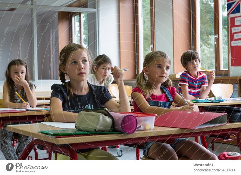 Attentive pupils at classroom schoolchildren schools education Classroom class rooms Schoolroom classrooms schoolgirl female pupils School Girl schoolgirls