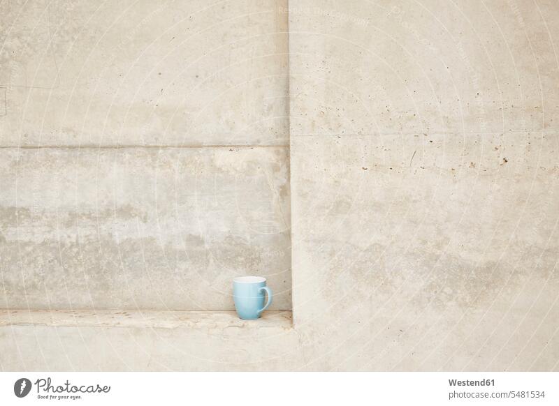 Cup in concrete ledge Coffee Cup Coffee Cups break niche niches nobody simplicity simple concrete wall concrete walls sparse Minimal copy space Germany