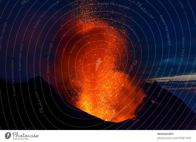Italy, Aeolian Islands, Stromboli, volcanic eruption before night sky background, lava bombs Energy Vigour Vigor Spiritedness Vitality Power glow embers nature