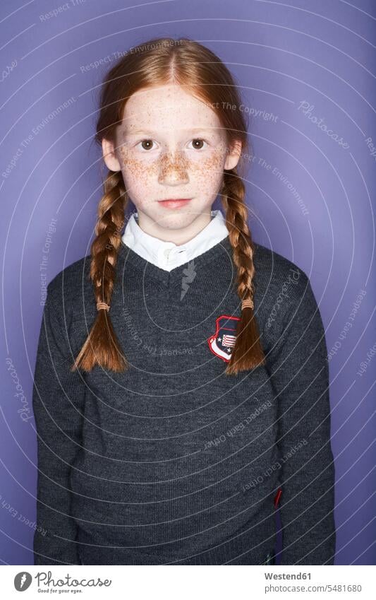 Portrait of redheaded girl with freckles portrait portraits females girls school uniform school uniforms child children kid kids people persons human being