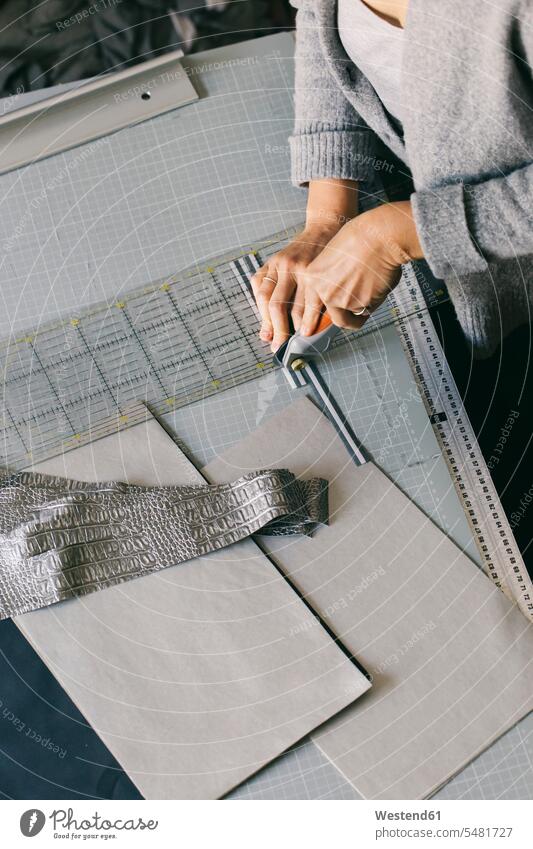 Close-up of fashion designer working on template At Work woman females women seamstress seamstresses Adults grown-ups grownups adult people persons human being