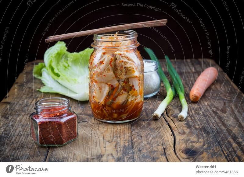 Glass of Kimchi and ingredients on dark wood food and drink Nutrition Alimentation Food and Drinks preserving jar Mason Jars mason jar preserving jars