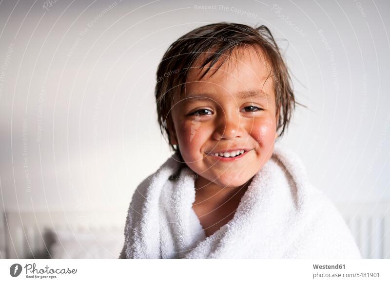 Portrait of smiling little boy with shower towel after taking a bath boys males child children kid kids people persons human being humans human beings towels