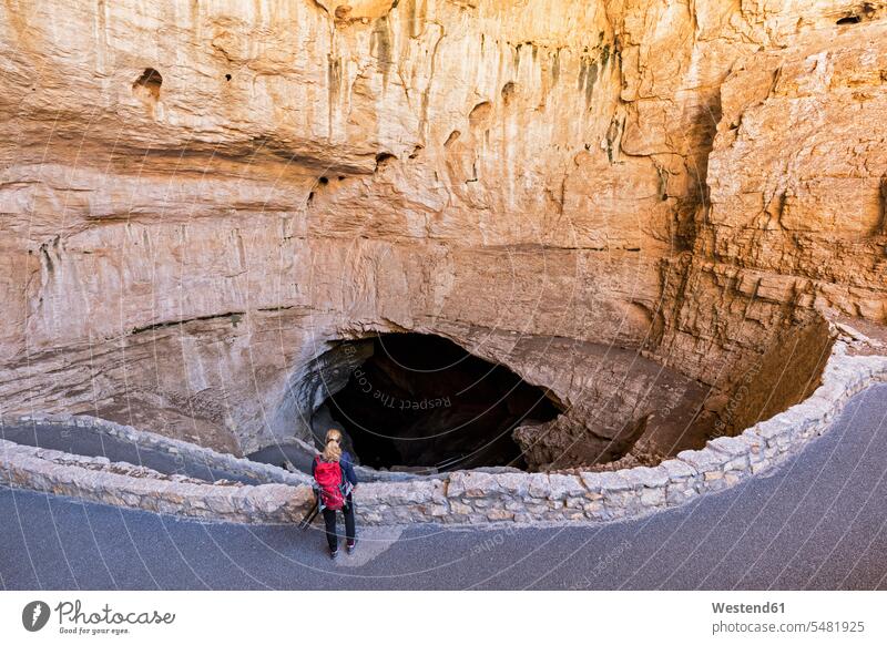 USA, New Mexico, Carlsbad Caverns, Tourist standing at entrance caucasian caucasian ethnicity caucasian appearance european Travel destination Destination