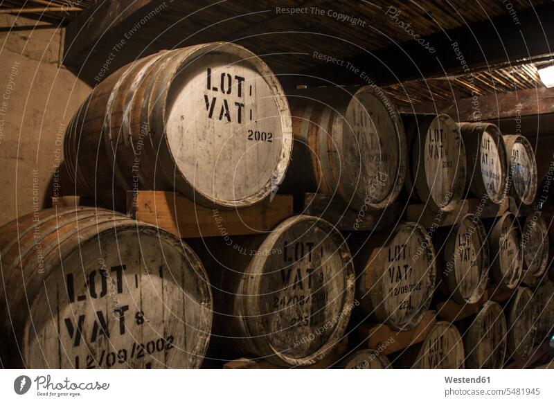 Old wooden barrels at a whisky distillery Whiskey Whisky Spirits liquors Alcohol alcoholic beverage Alcoholic Drink Alcoholic Drinks alcoholic beverages