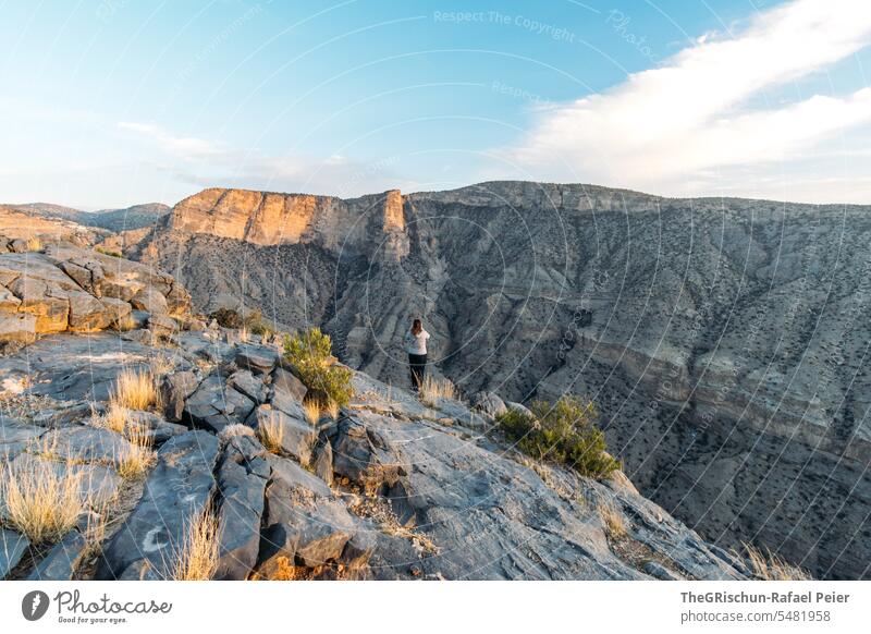 Panoramic view of sunset - woman enjoying the last rays of sunshine Oman Steep hilly Sunset Moody Jebel Akhdar Dry Hot Nature Colour photo Sky Tourism Arabia