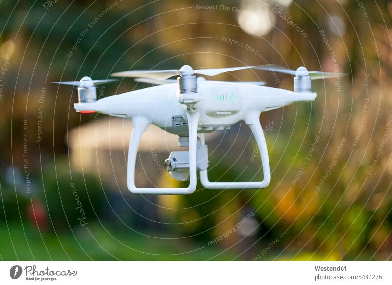 Flying drone with camera motion Movement moving cameras unmanned aerial vehicle drones outdoors outdoor shots location shot location shots white on the move