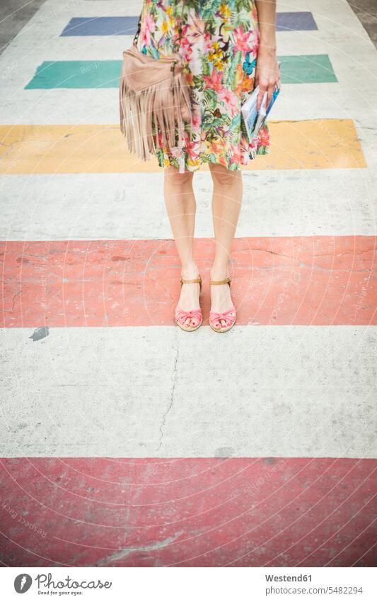 USA, Florida, Key West, woman standing on multicolored crosswalk caucasian caucasian ethnicity caucasian appearance european leisure free time leisure time road