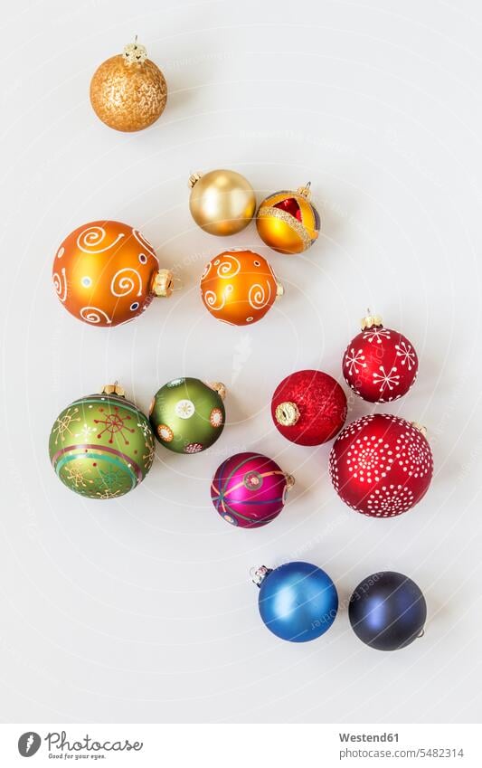Christmas baubles on white background overhead view from above top view Overhead Overhead Shot View From Above studio shot studio shots studio photograph