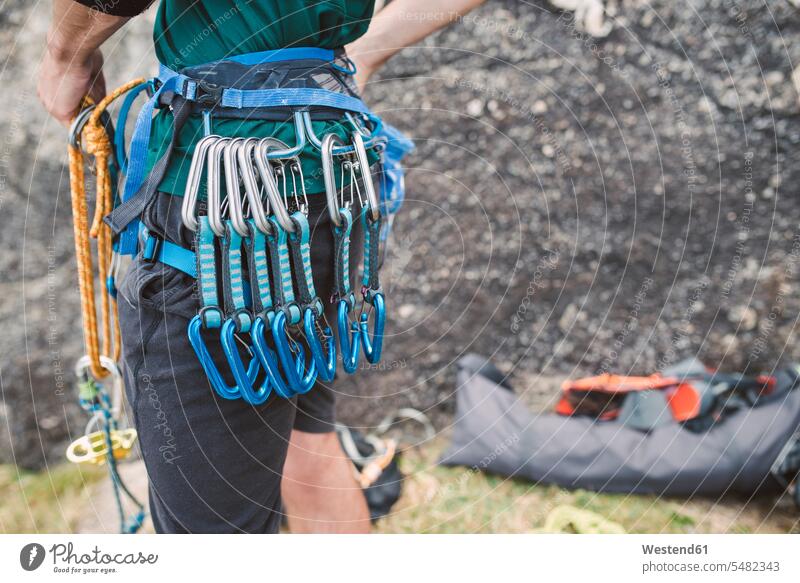 Close-up of climber with climbing equipment man males carabiner Carabiners snap hook Adults grown-ups grownups adult people persons human being humans