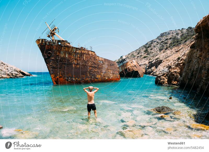 Greece, Cyclades Islands, Amorgos, Man at the beach, visiting a shipwreck, Olympia Horror horrified tourist tourists ship wreck journey travelling Journeys