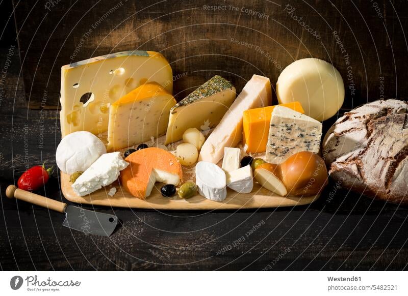 Cheese platter with different sorts of cheese Variety diversity Diverse varied diversification hearty savoury food lusty Cheddar Cheddar Cheese various