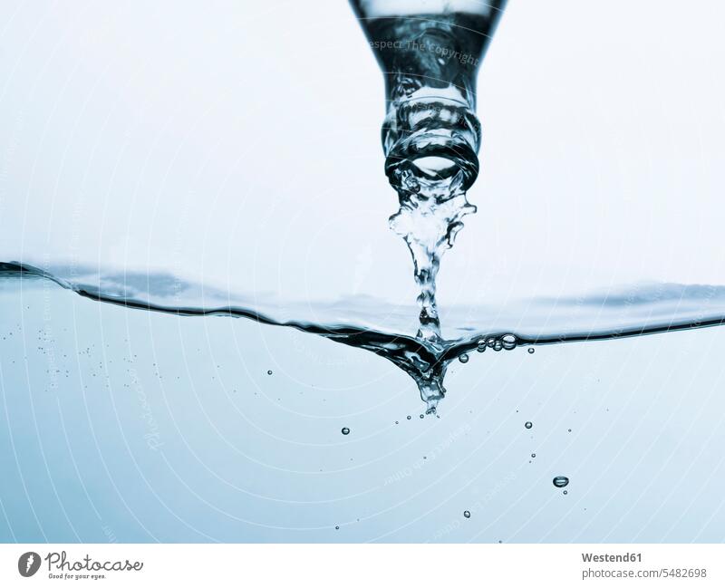 Mineral water pouring from bottle motion Movement moving Life healthy eating nutrition Lifestyles close-up close up closeups close ups close-ups water surface