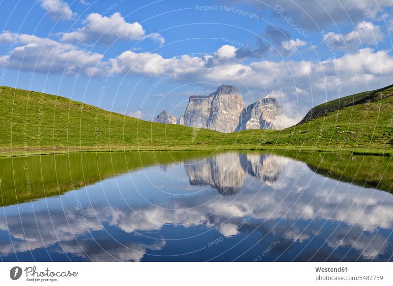 Italy, Province of Belluno, Dolomites, Selva di Cadore, Monte Pelmo reflecting in Lago delle Baste cloud clouds rocky Travel Solitude seclusion Solitariness