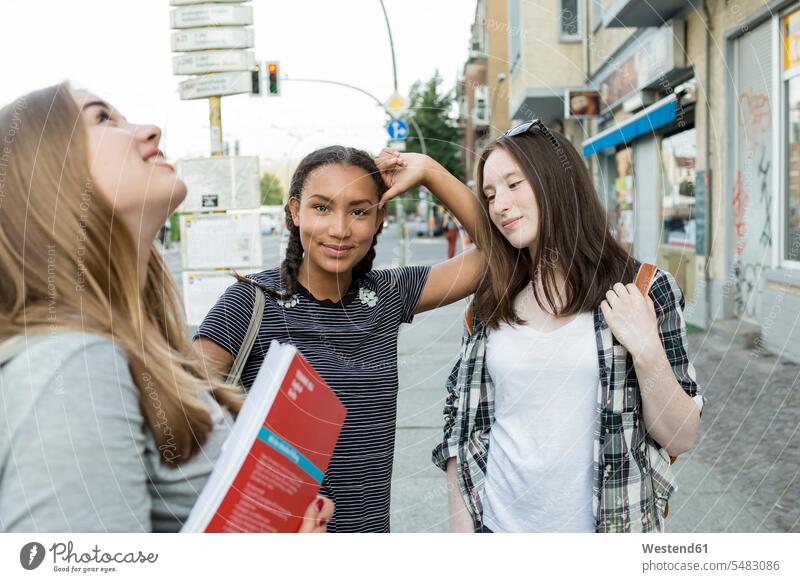 Three teenage girls on their way to school caucasian caucasian ethnicity caucasian appearance european schoolgirl female pupils School Girl schoolgirls
