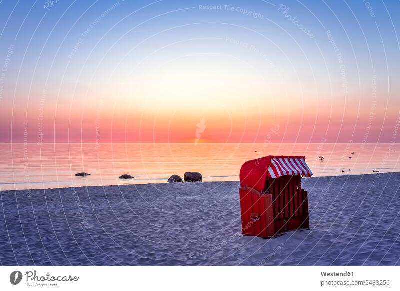 Germany, Ruegen, Binz, beach at sunset hooded beach chair roofed wicker beach chair Hooded Beach Chairs beach chairs Baltic sea seaside resort