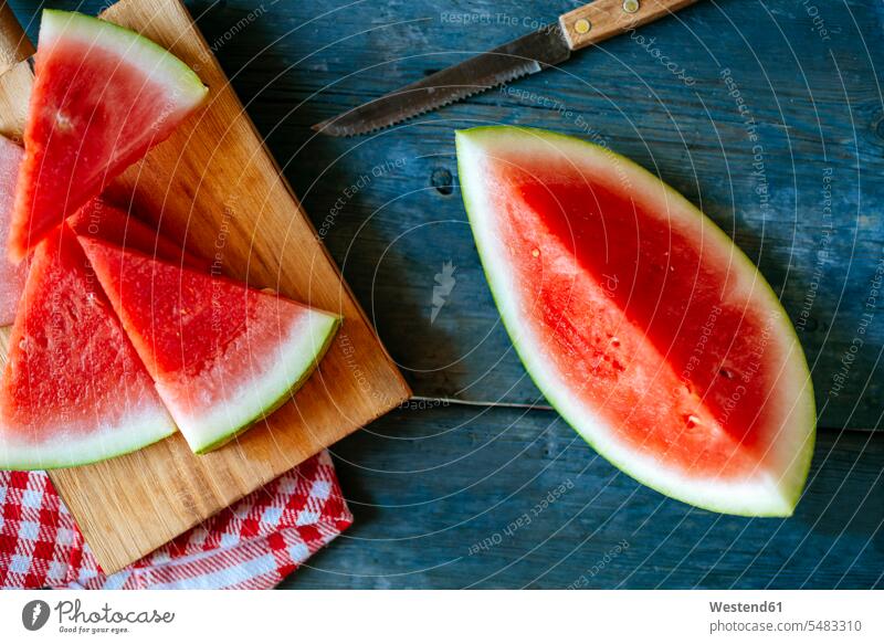 Plate of watermelon, cut on blue wood Watermelon Watermelons Water Melon Water Melons pieces sweet Sugary sweets Fork Forks healthy eating nutrition wooden