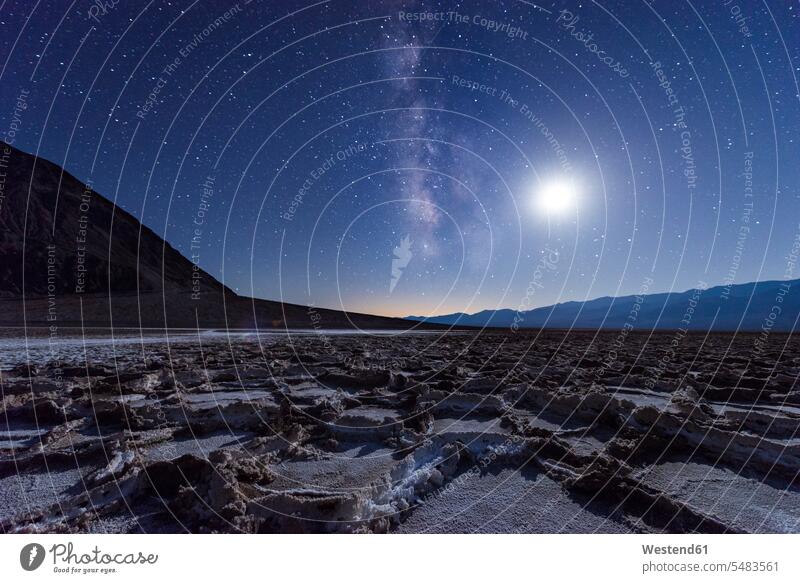 USA, California, Death Valley, Milky way and the moon over Badwater Basin Death Valley Desert Salt Desert salt plain salt flat salt flats landscape landscapes