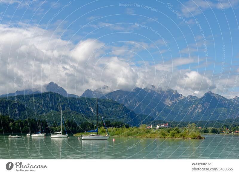 Germany, Bavaria, Swabia, East Allgaeu, Schwangau, Lake Forggensee near Fuessen cloud clouds Alps the Alps sailing boat sailboat Sail Boat Sailboats