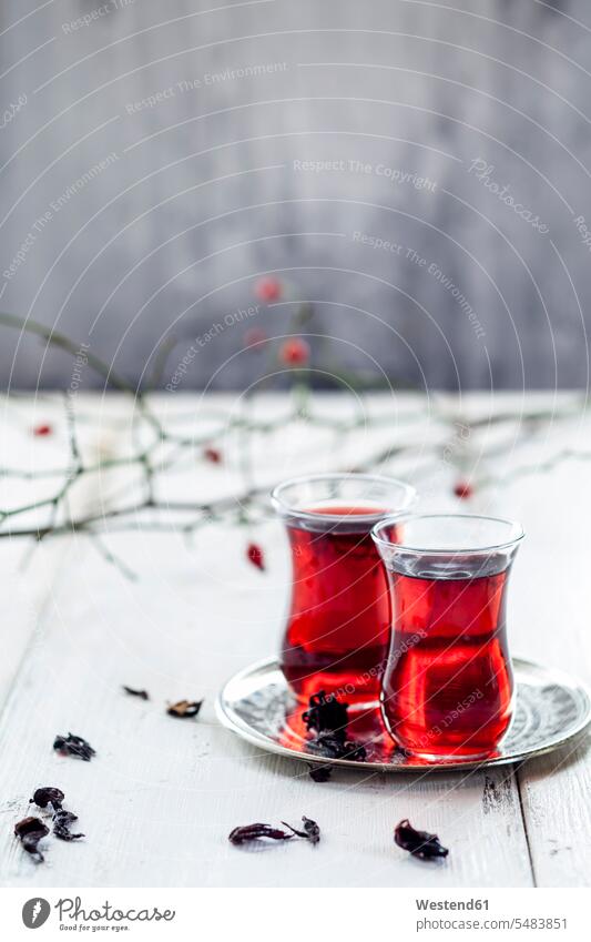 Hollyhock tea in tea glasses Glass Glasses delicacy specialty specialties aroma flavour aromatic dried table mat trivet hollyhock tea hollyhock flower