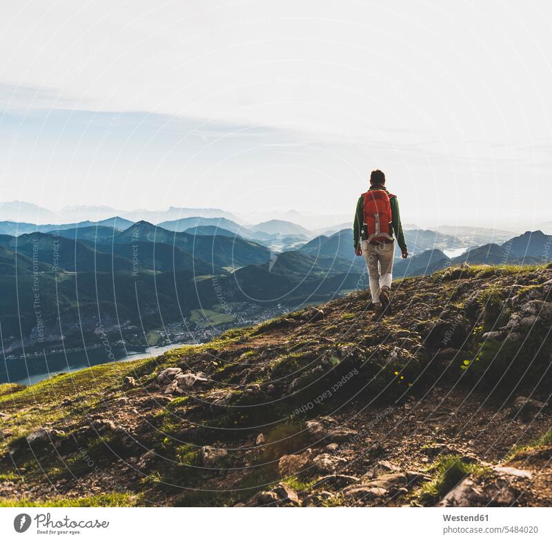 Hiker with backpack hiking in the Alps caucasian caucasian appearance caucasian ethnicity european White - Caucasian mature woman mature women 50-55 years