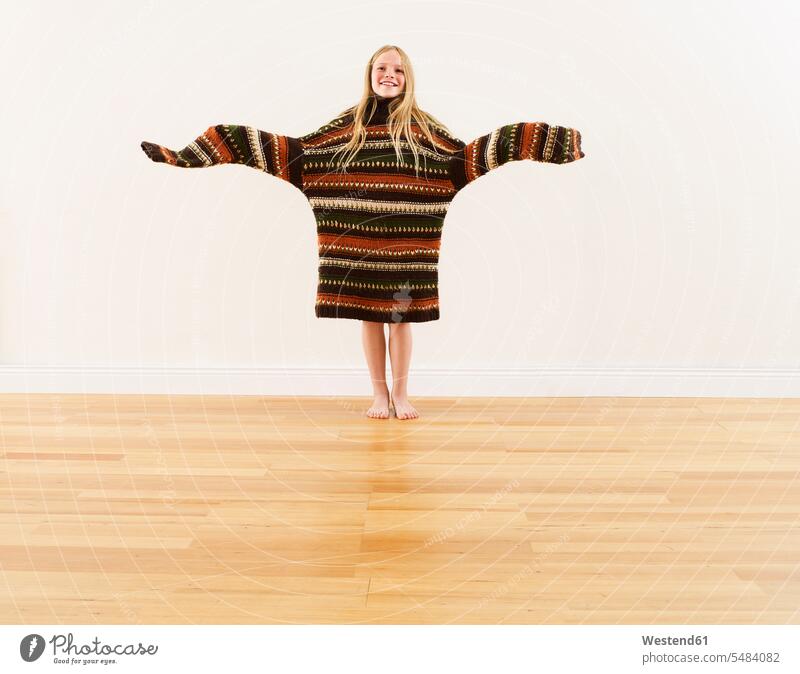 Girl wearing oversized knit pullover girl females girls humongous gigantic giant enormous tremendous knit sweater Cardigan Sweater child children kid kids