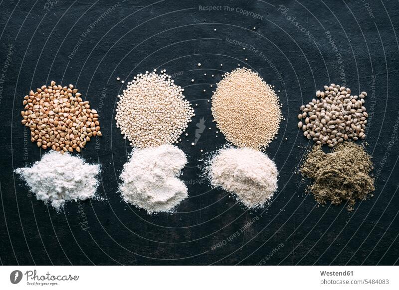 Pseudocereals and flour, Buckwheat, Quinoa, Amaranth, Hemp pseudocereal amaranth amarathus grains Kernels seed seeds overhead view from above top view Overhead