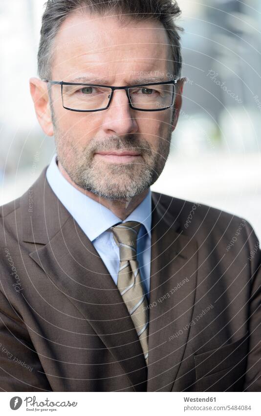 Portrait of serious looking businessman with spectacles and stubble caucasian caucasian ethnicity caucasian appearance european assertive Assertiveness Cologne