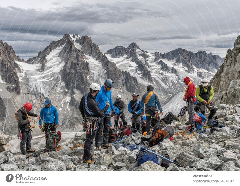 France, Chamonix, Grands Montets, Aiguille d' Argentiere, group of mountaineers preparing climber alpinists climbers Mountain Climber Mountain Climbers hiking