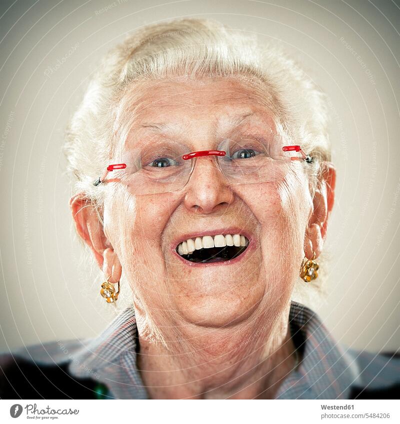 Portrait of an elderly lady, laughing out loud cheerful gaiety Joyous glad Cheerfulness exhilaration merry gay glasses specs Eye Glasses spectacles Eyeglasses