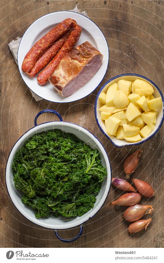 Steamed green cabbage, potatoes, onions, smoked pork chop and minced pork sausage food and drink Nutrition Alimentation Food and Drinks steamed stew Sausage