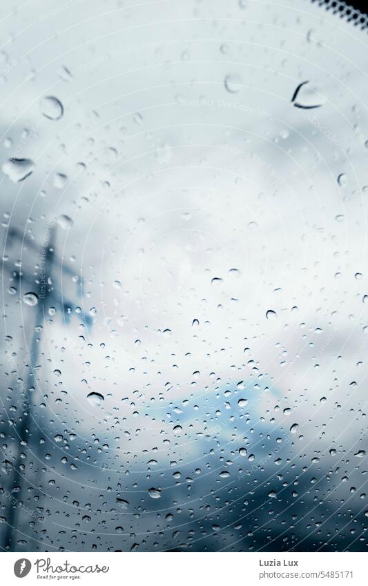 View from car window, raindrops and a power pole in blur Window Glass Car Window Slice Rain Sky Blue dark blue stormy Autumn Autumnal Weather Drop Wet