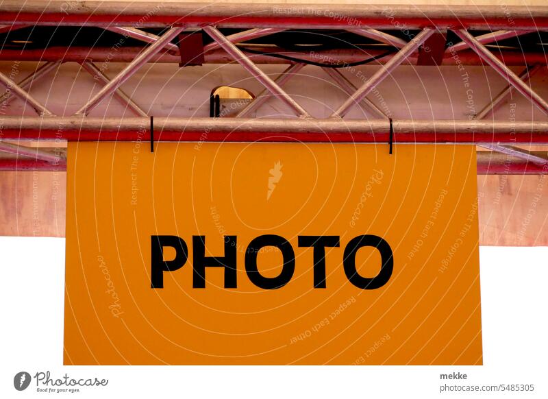 Yellow sign for photographers Photography Signs and labeling Press Signage Clue Road marking Orientation Street Navigation Exhibition event Site Take a photo