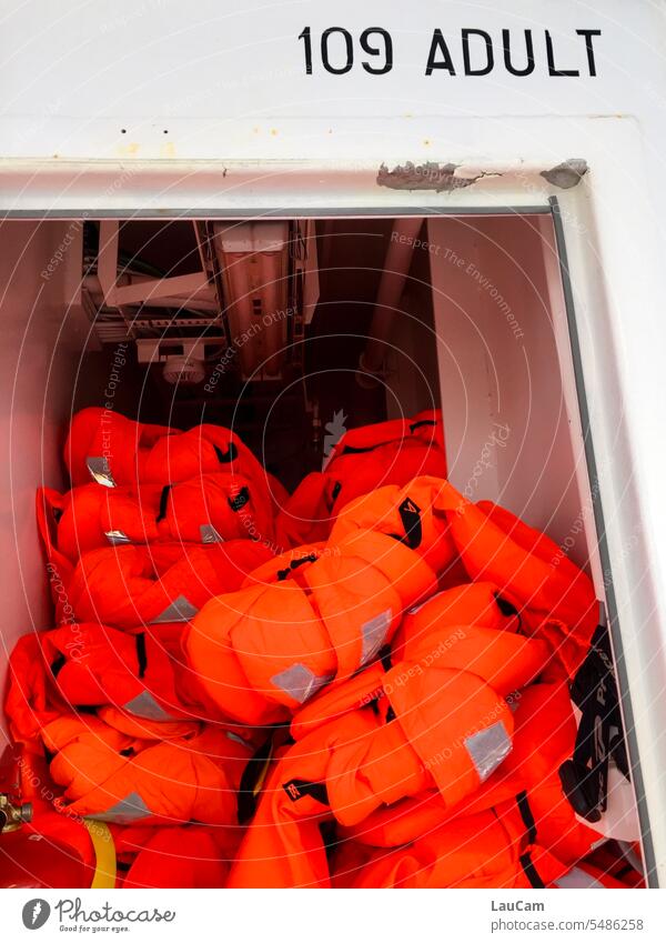Lifesavers - 109 life jackets Rescue Red Orange signal colour be afloat Drown Emergency Lifesaving life-saving SOS Safety Protection