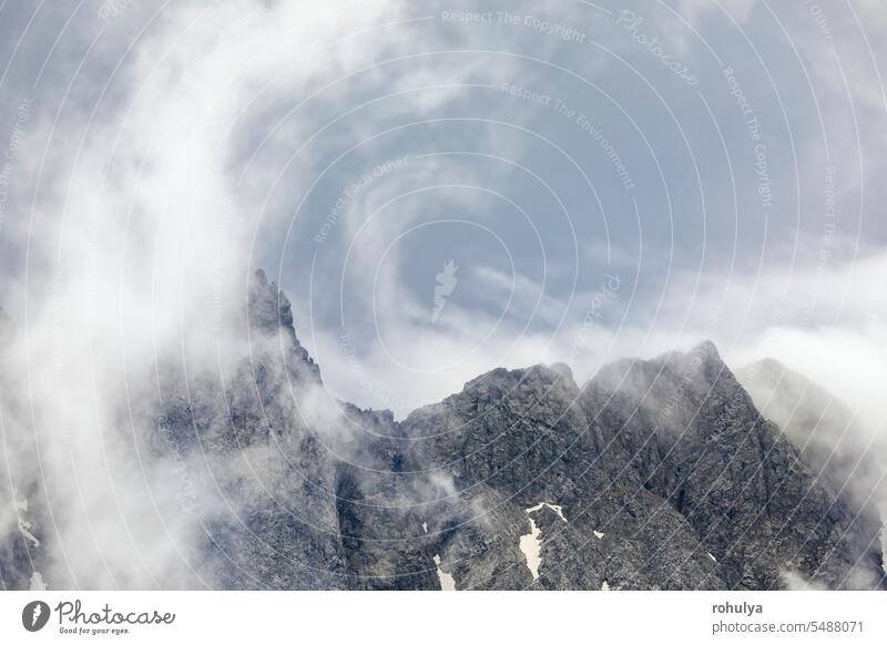 fog and clouds above mountain peaks rock mountains Zugspitze cloudscape storm dramatic weather rain shower thunderstorm view scenic scenery landscape nature