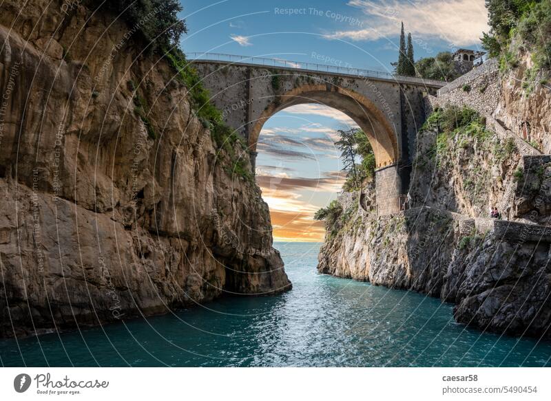 Scenic arch bridge at the Fjord of Fury, Amalfi Coast coast furore fury fjord italy sunrise scenic sunset fiord italian famous european beach cliff rock sea