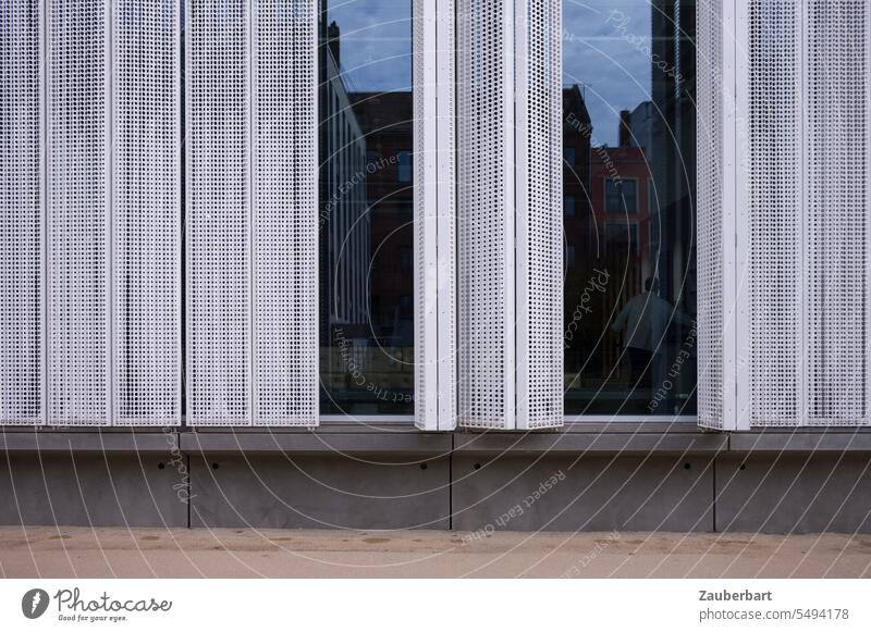 Shutters of a modern building, behind them panes with reflection like a glimpse, abstraction Window Architecture Modern Concrete sales Abstract Vista Insight