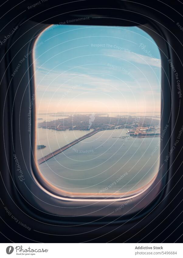 Breathtaking view through airplane window jet fly high island old city breathtaking majestic venice italy europe travel tourism vacation weekend voyage