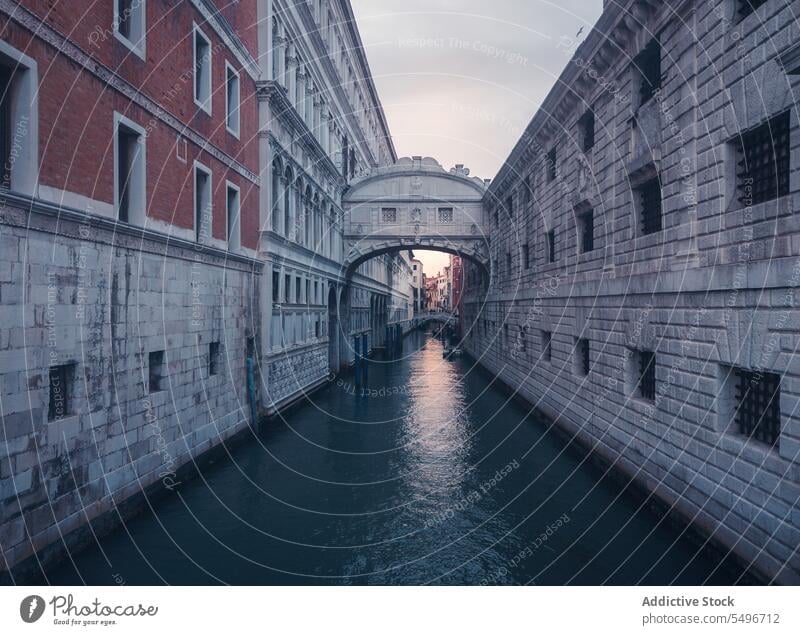 Scenic view of Bridge of Sighs over canal bridge of sighs ponte dei sospiri doges palace new prison arched passage old historic building venice italy europe
