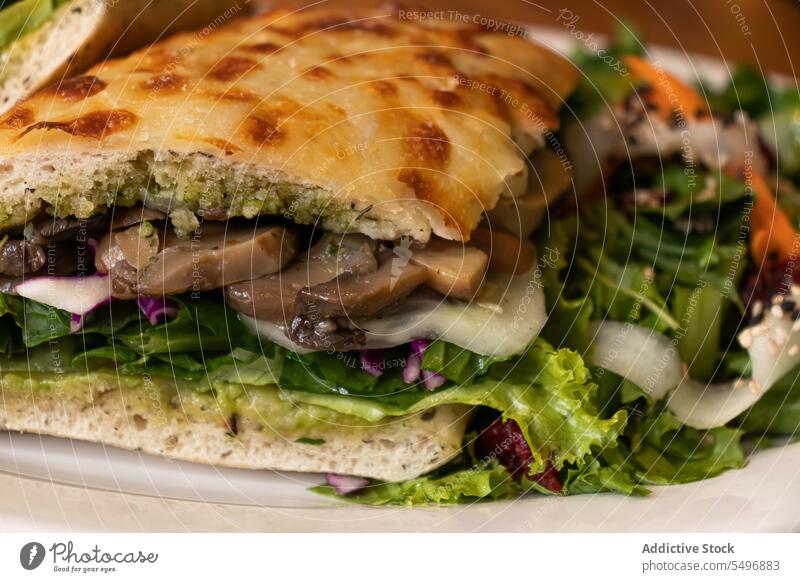 Delicious baked chapatas with mushrooms and vegetables salad in plate food fresh appetizing ingredient chop lettuce delicious meal tasty dish nutrition culinary