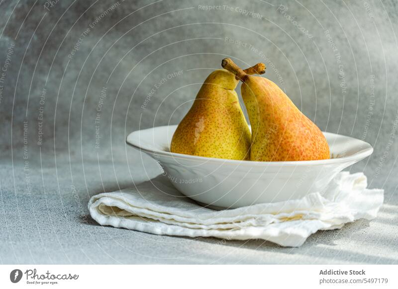 Marble plate with ripe pears bowl rustic table concret cotton eco friendly food organic fresh healthy fruit white natural juicy grocery vegetarian vitamin diet