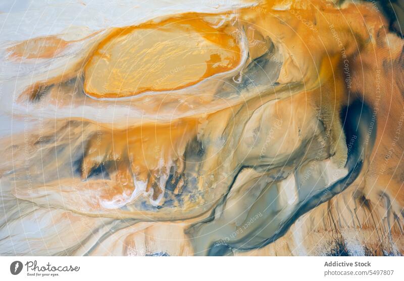 Textured backdrop of yellow mineral surface background texture abstract colorful uneven relief pigment minimal plain diffuse blot structure tint rough shape