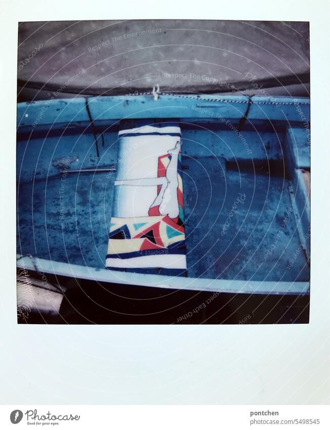 a towel with motif in a blue boat. polaroid Towel fish Blue Legs 80s Pattern faded Water Harbour vacation travel Summer Polaroid vintage