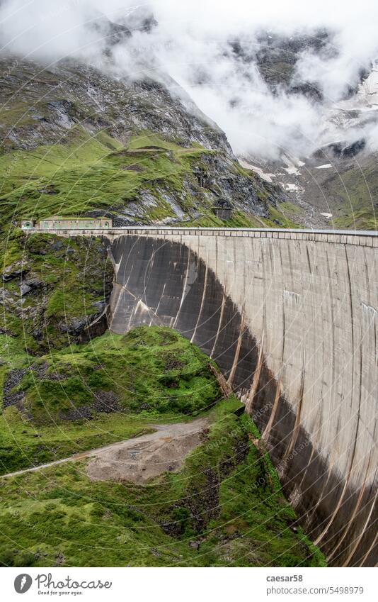 Impressing dam wall from the Mooserboden reservoir near Kaprung alps austria energy giant lake landscape wilderness mountain scenic construction engineering