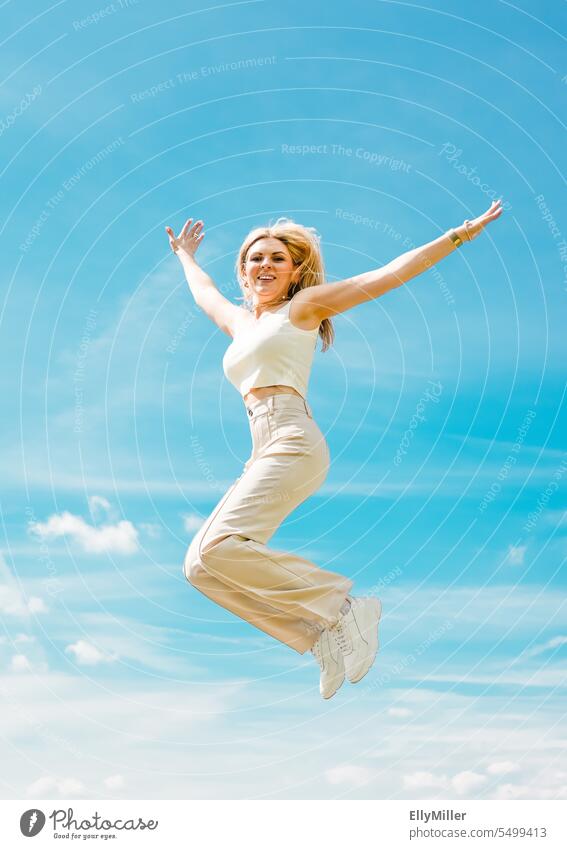 Leap into the air. Feeling of freedom. jump Air Freedom Joy Summer Happy Sky Jump Joie de vivre (Vitality) Movement Athletic Enthusiasm Woman Blue Happiness