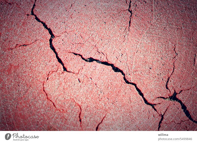 Sex and prayer. Asphalt cracks ripped elevation Broken Red Crack & Rip & Tear Broken open Road damage